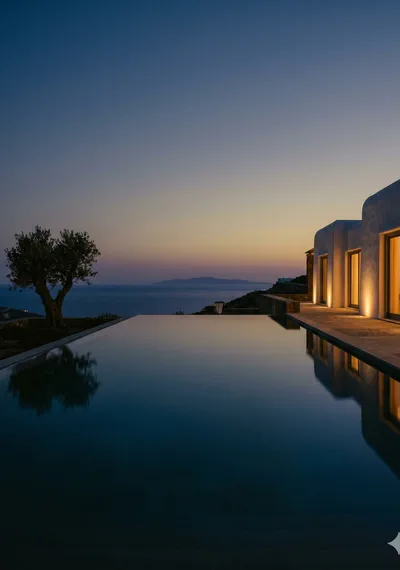 Villa with infinity pool at twilight