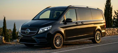 Mercedes V-Class on a coastal Greek road at sunset